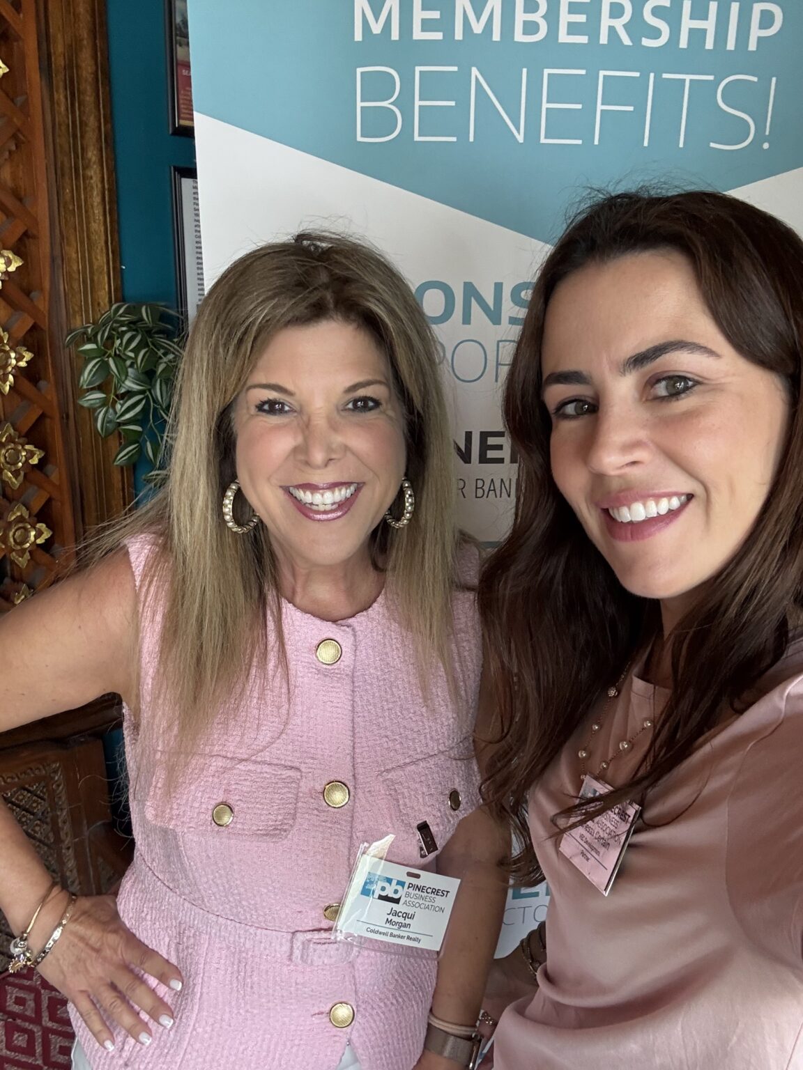 Two PBA attendees sharing a smile at an event